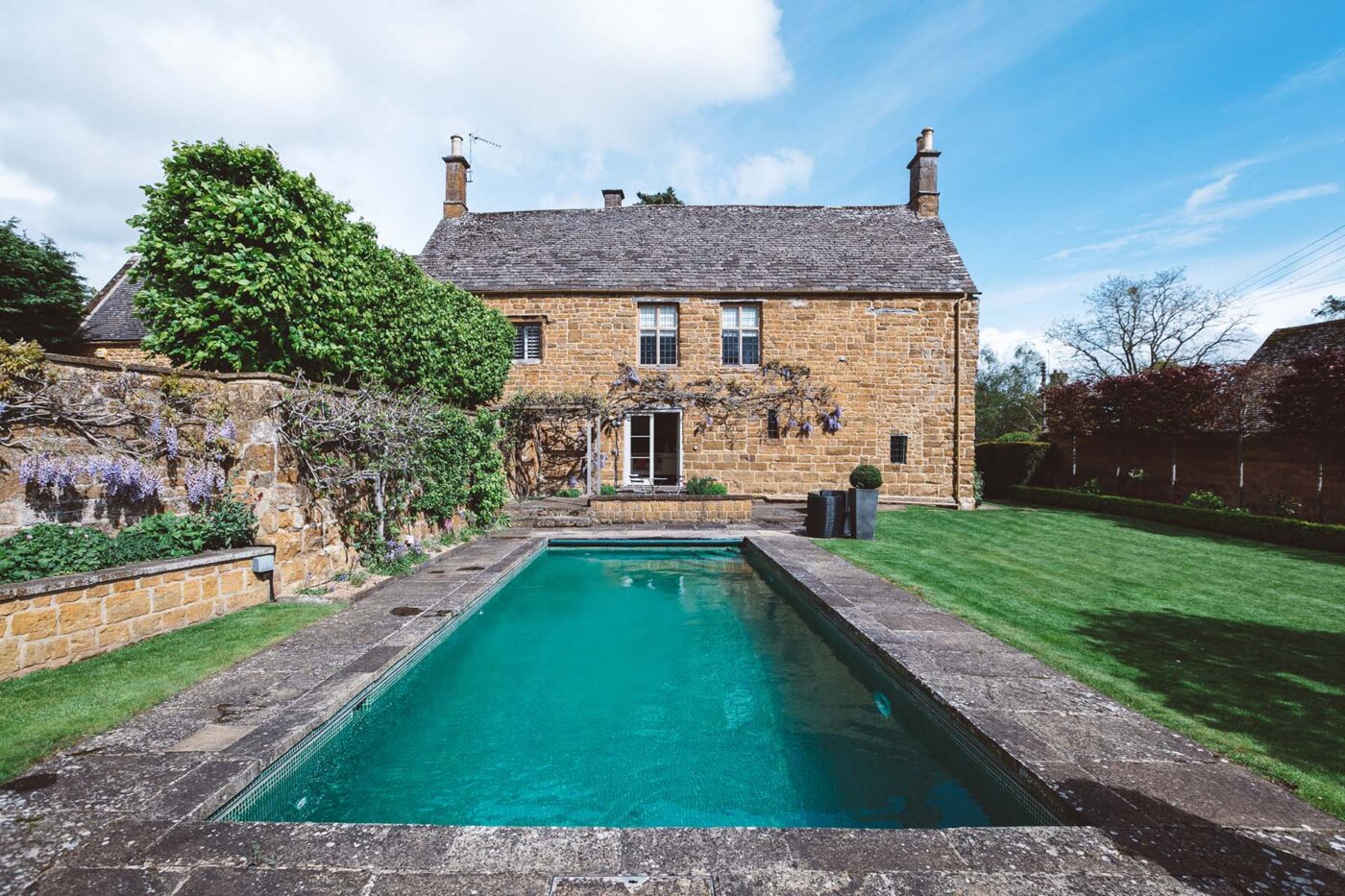 The Old Dairy outdoor view over swimming pool