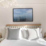 Double bed with natural sunlight