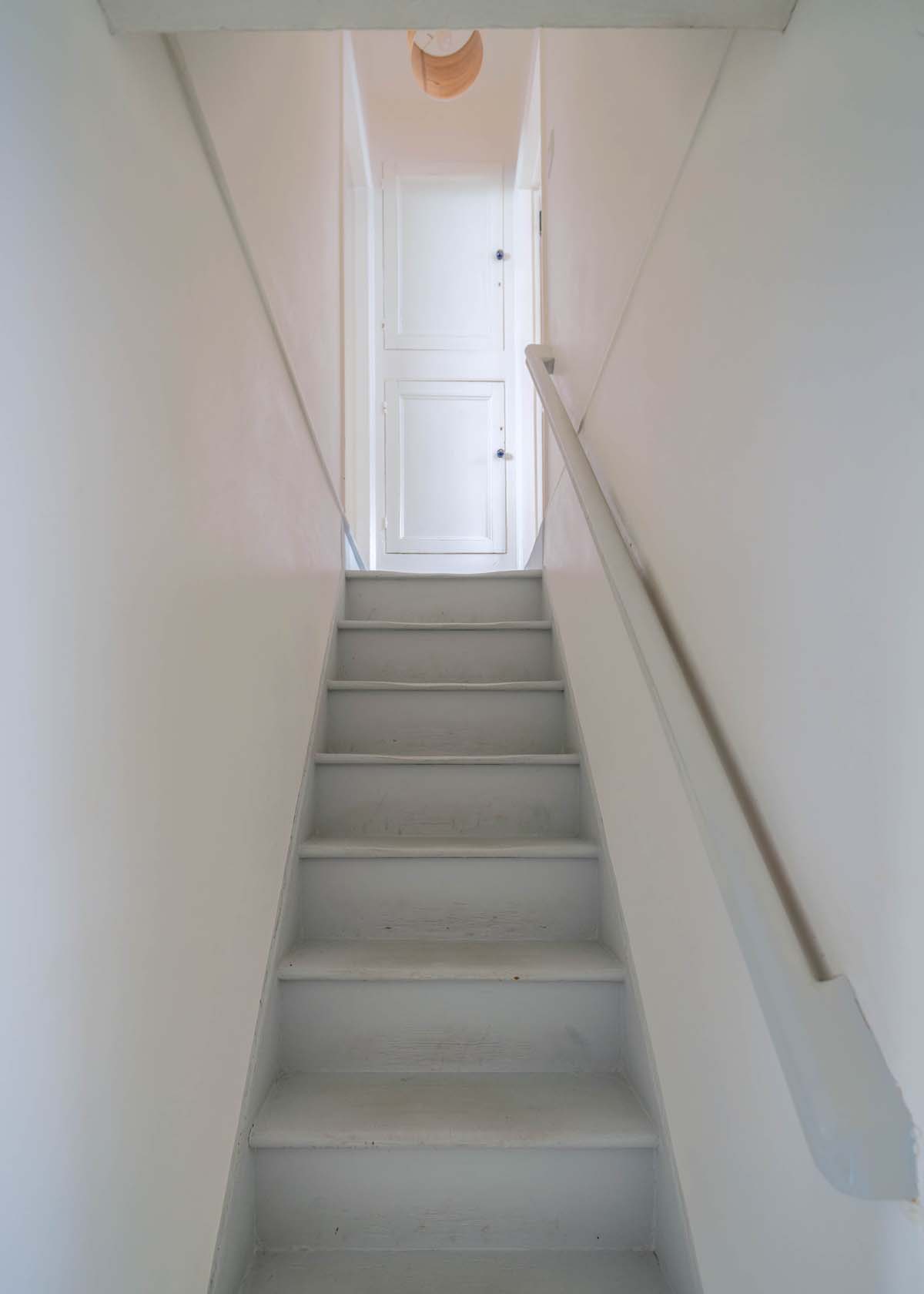 White wooden staircase