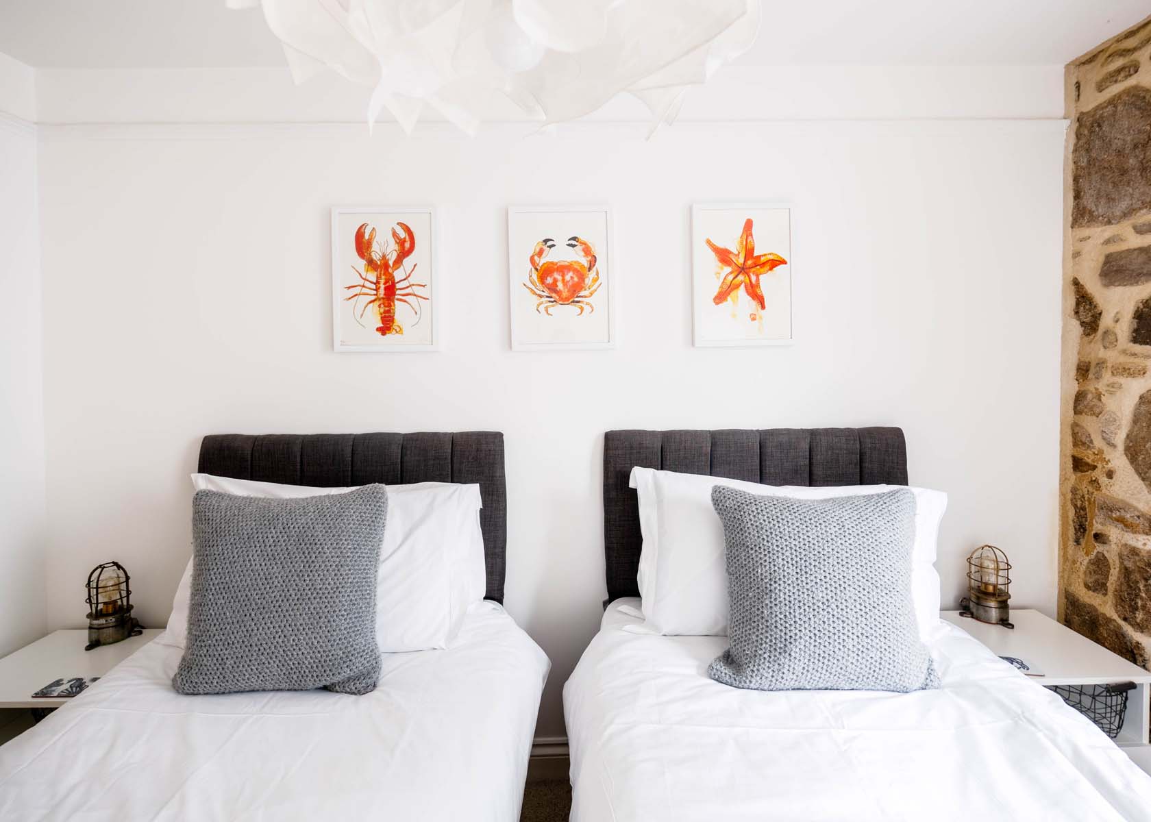 Twin bedroom with artwork