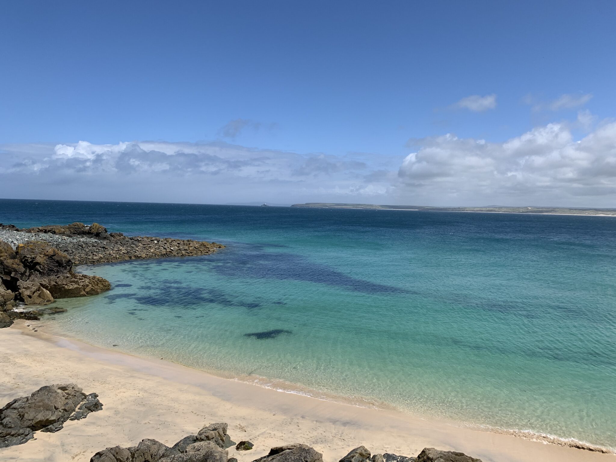 Bamaluz Beach St Ives in summer with clear blue water