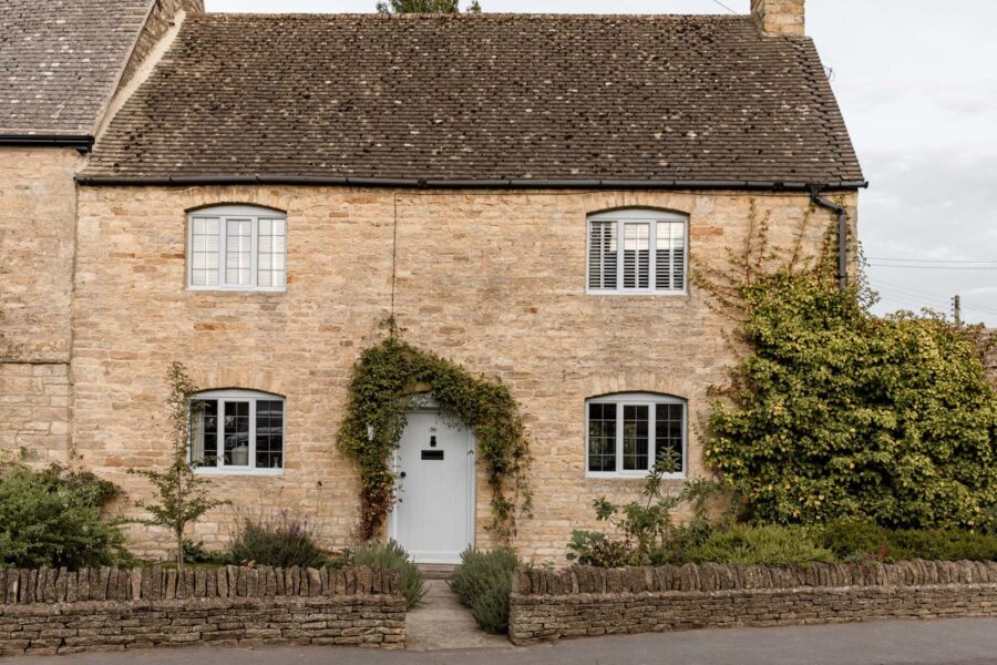Stone cottage exterior with blue painted door