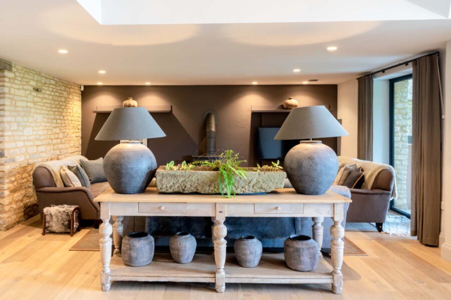 Living area with grey sofas, wooden floors and stylish furnishings