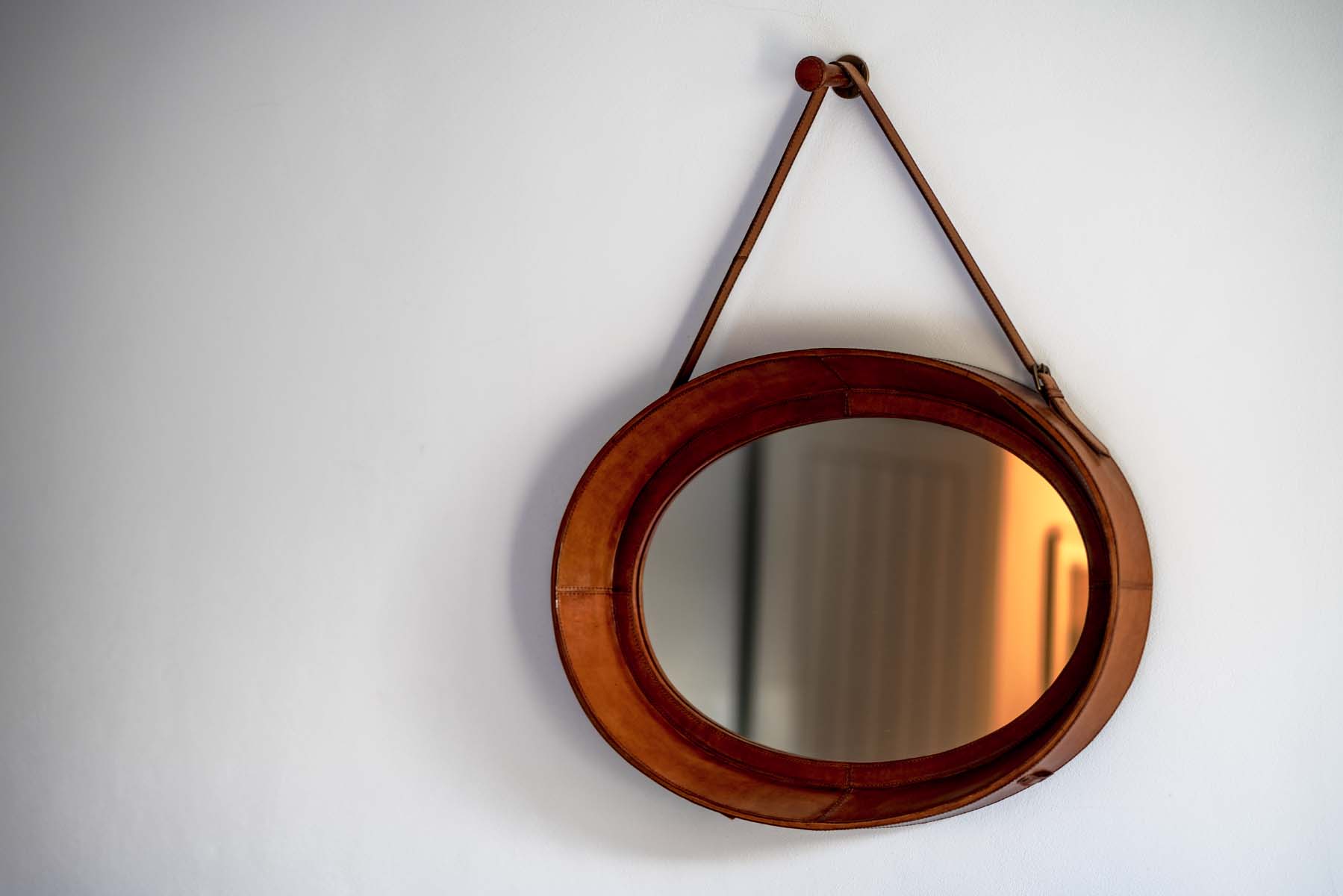 Oval wooden mirror