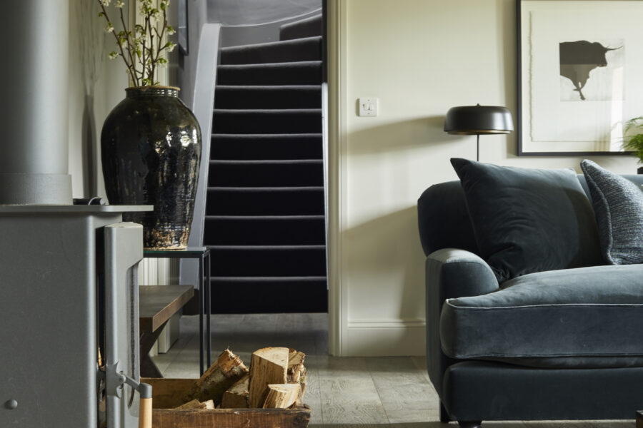 Blue sofa with log burner