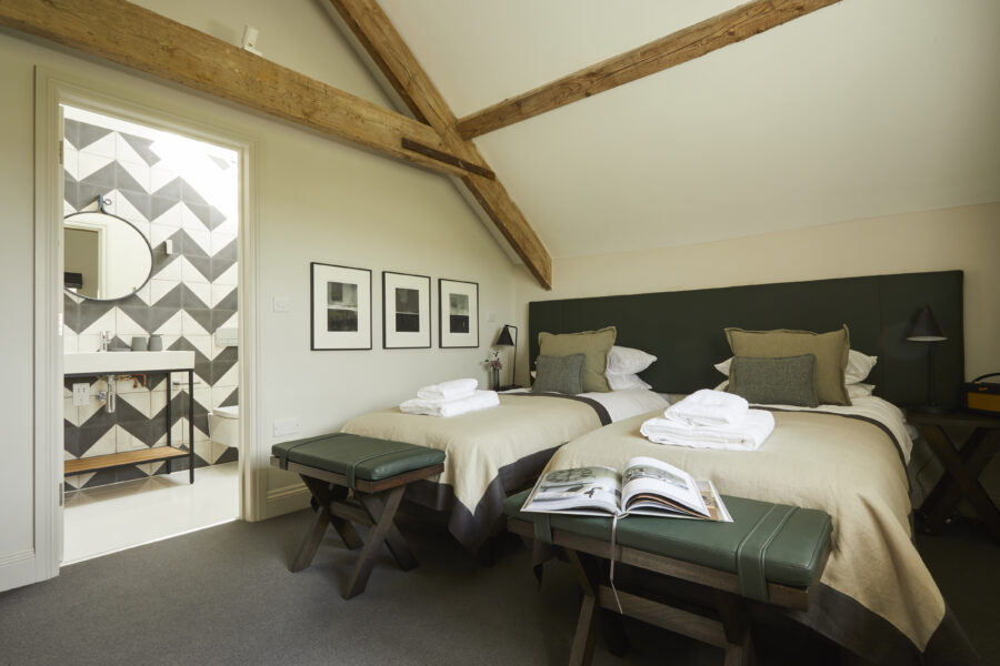 Bedroom with two single beds and ensuite bathroom