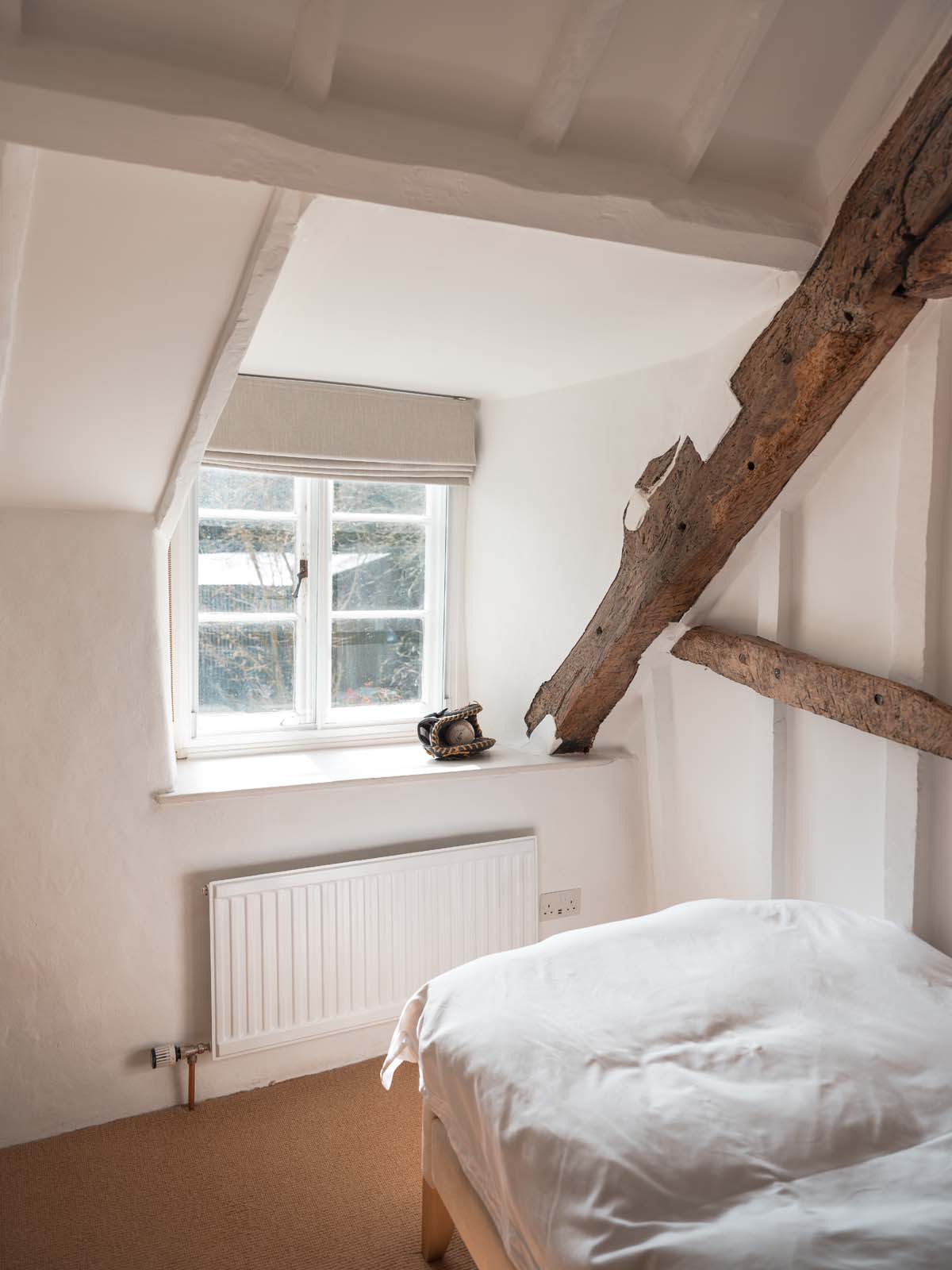 View from one of the bedrooms and the cottage wooden beams