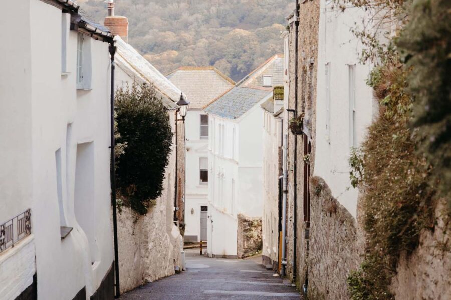 Narrow street with little white cottages