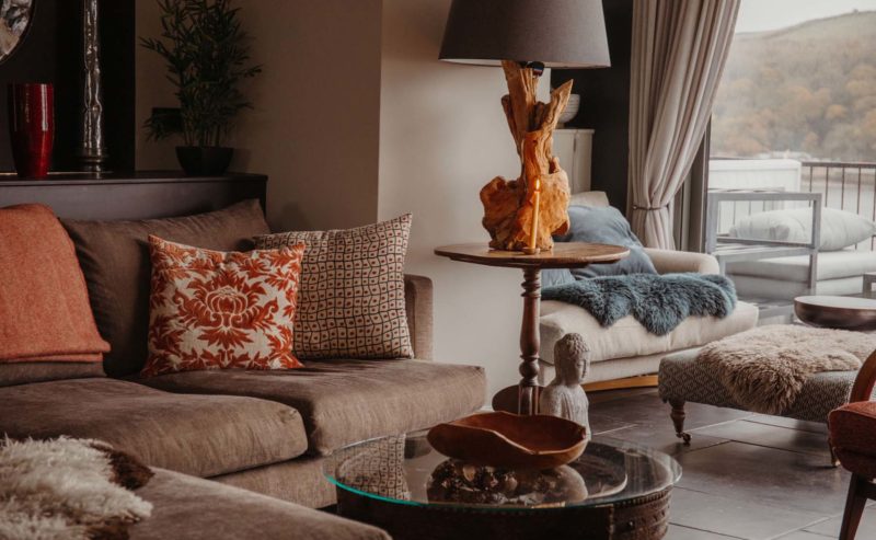 Neutral corner sofa with decorative cushions