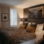 Cosy bedroom with fur throw