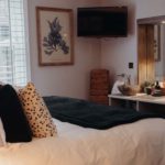 Luxurious bedroom with corner tv