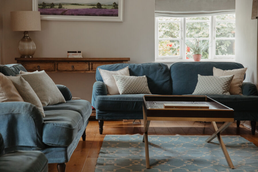Sitting room with two blue sofas