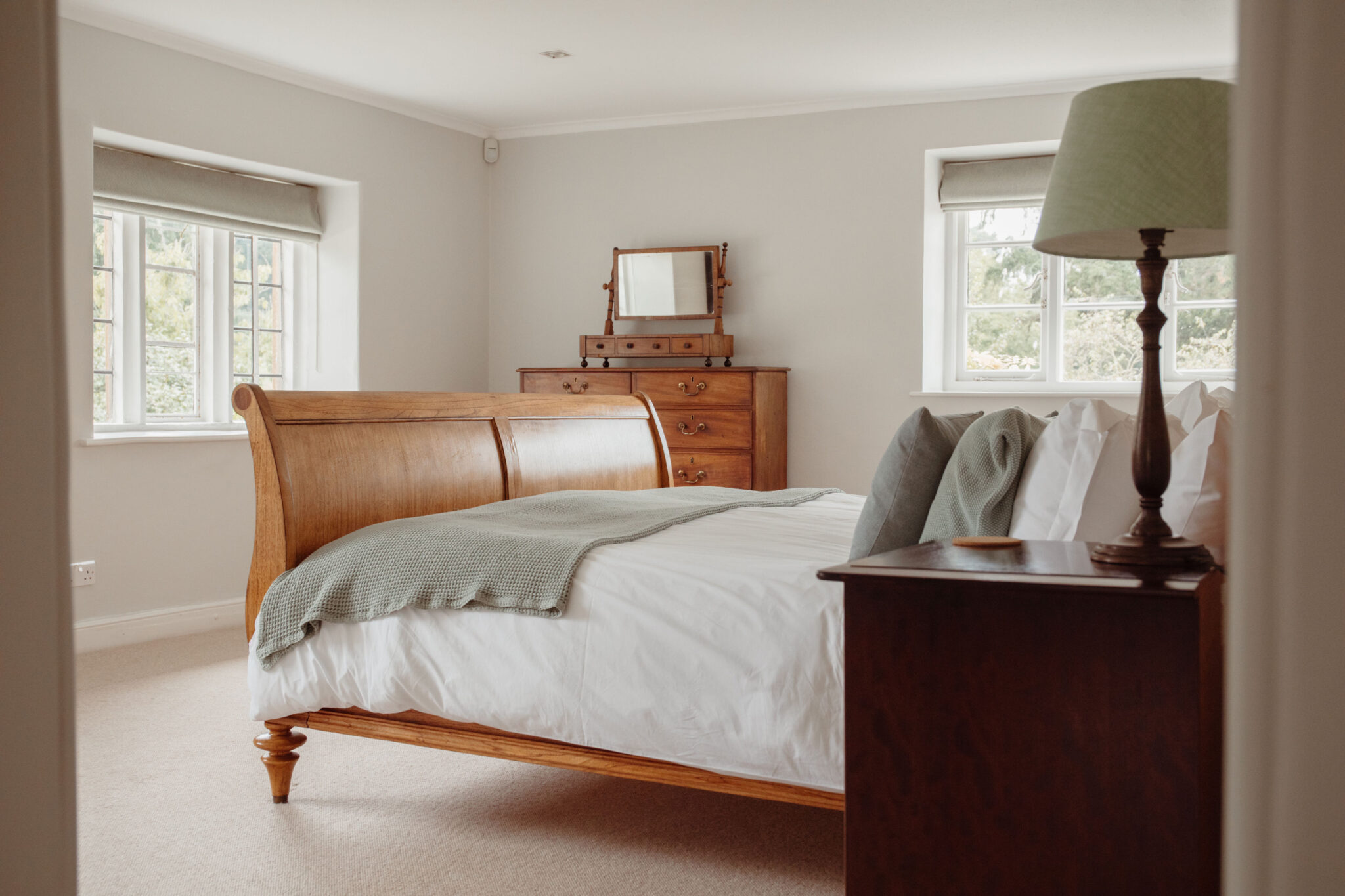 A beautiful curved wooden bed frame