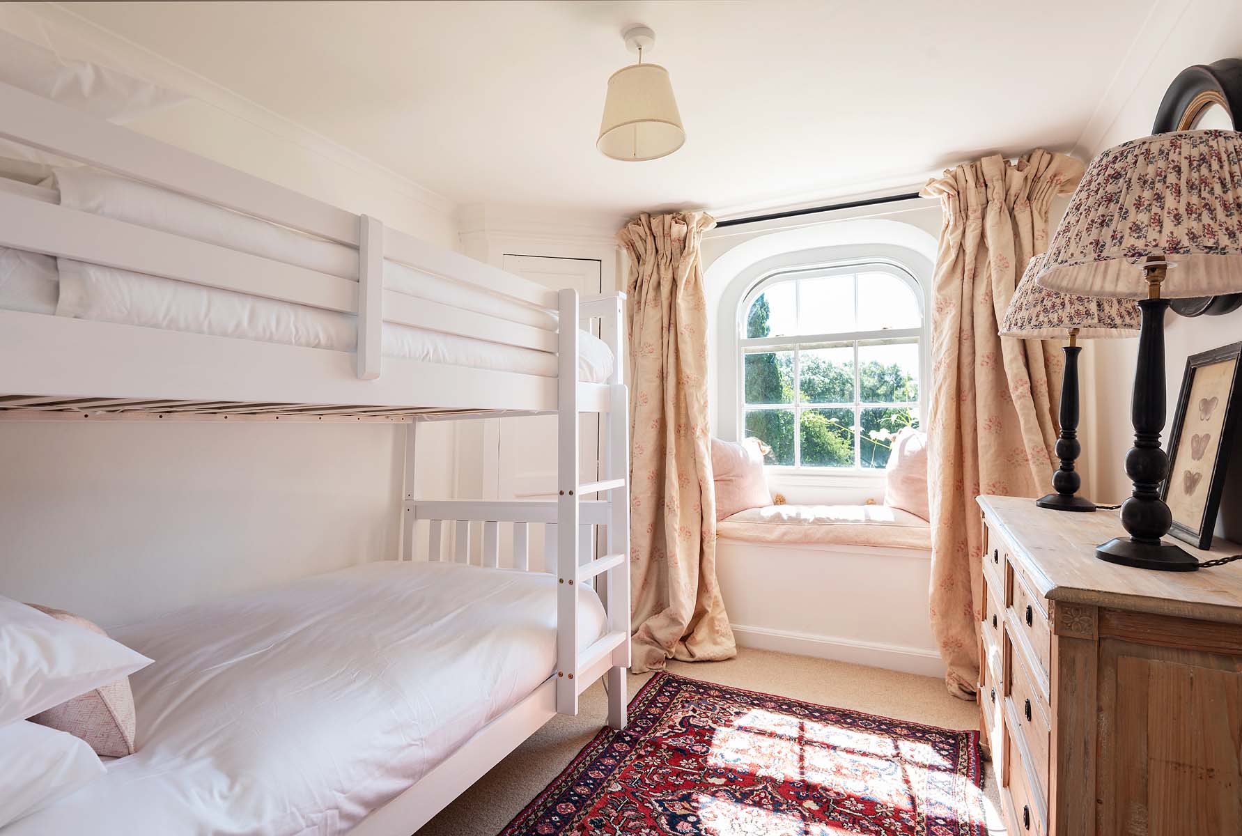 The bedroom with bunkbeds and garden view