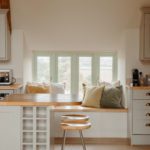 Modern shaker style kitchen with a window seat