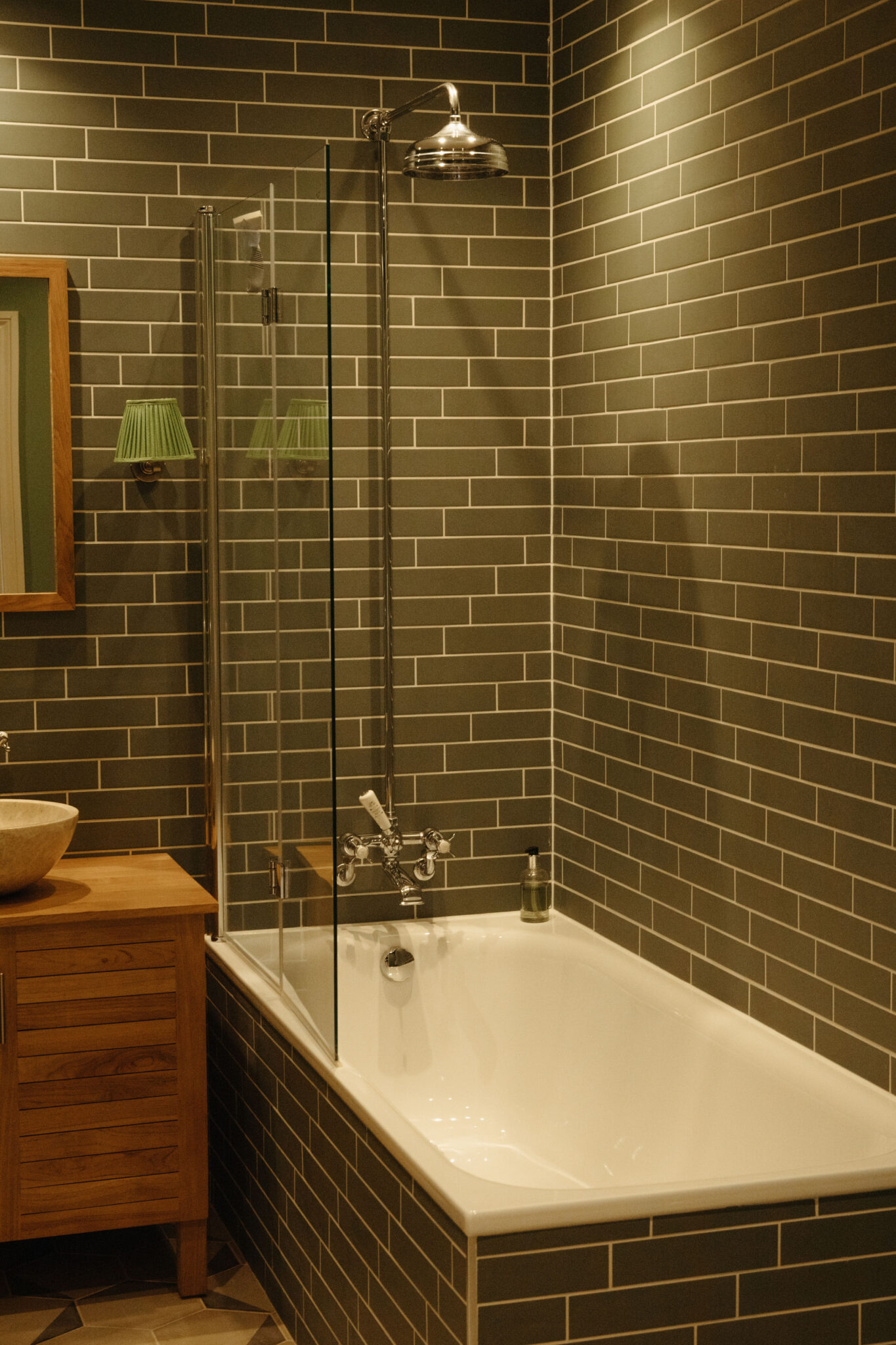 Bathroom and shower with green tiles