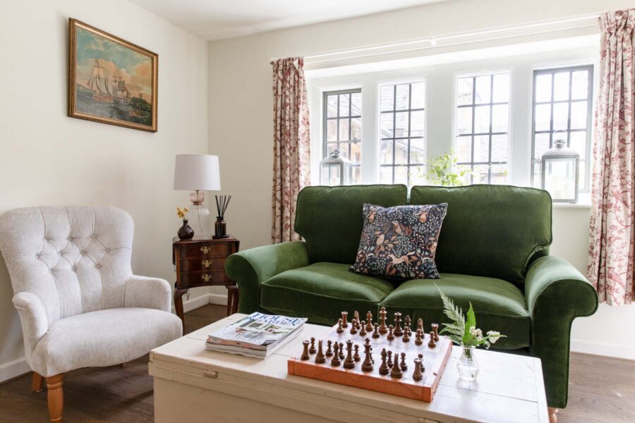 Green velvet sofa living room with chessboard