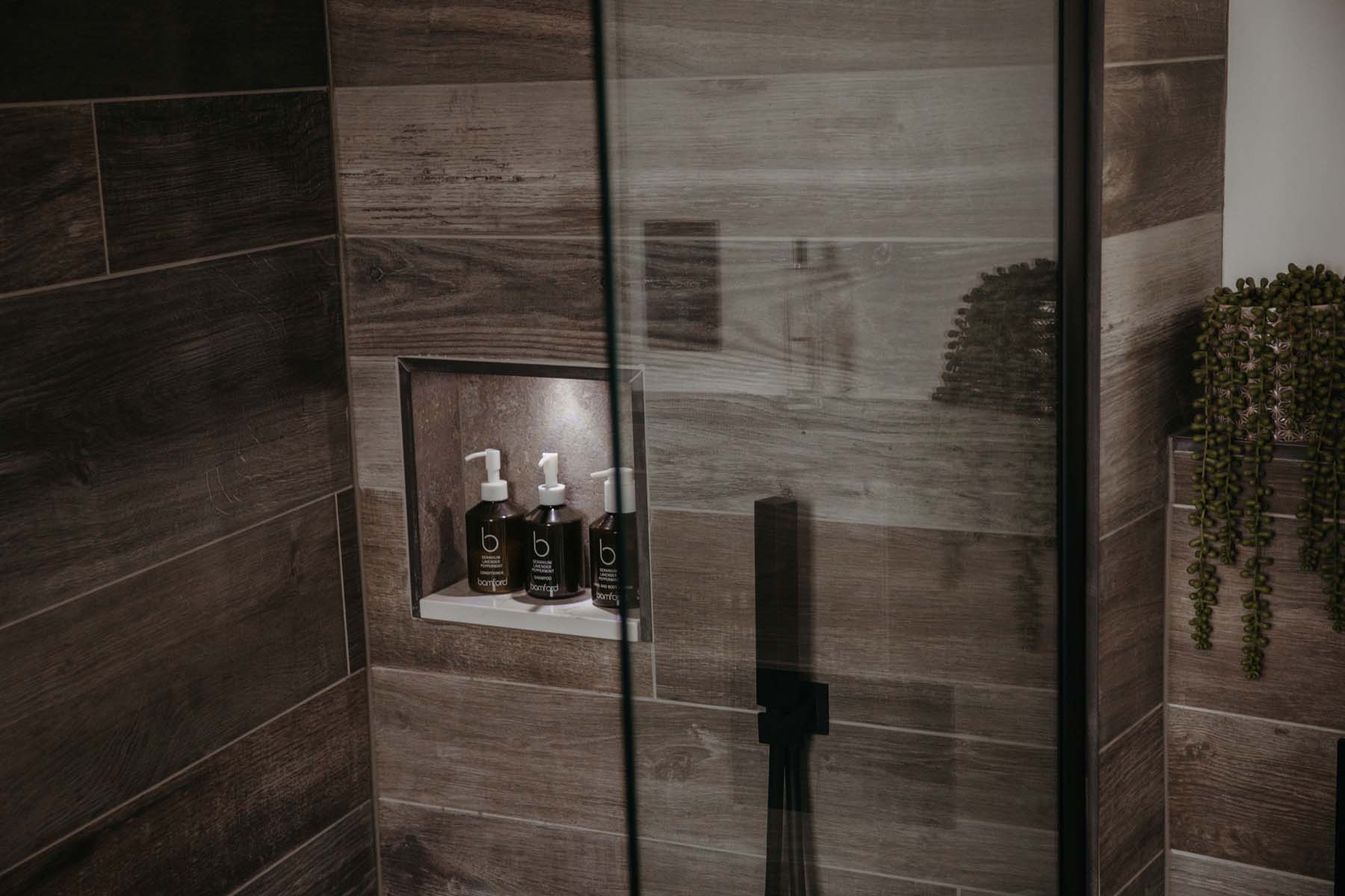 Slate grey shower with Bamford bathroom products
