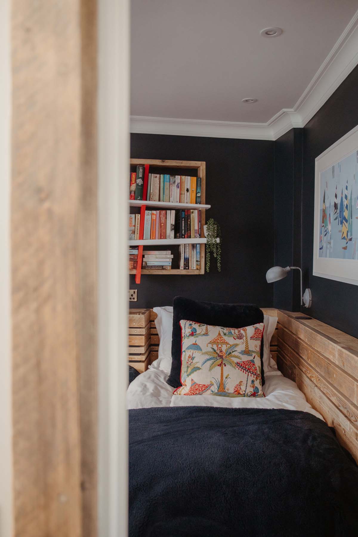 Kids bedroom wooden bookshelf on the wall
