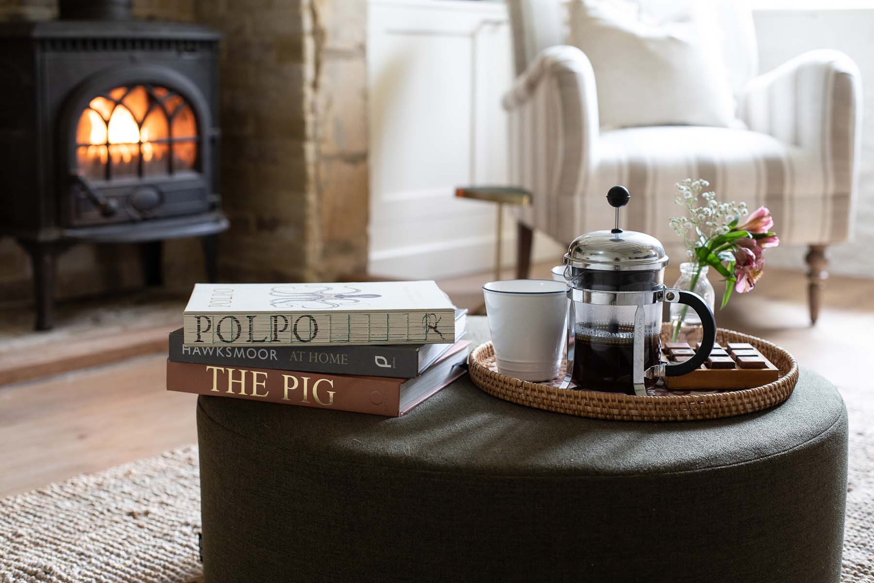 cosy sitting room coffee table and fire
