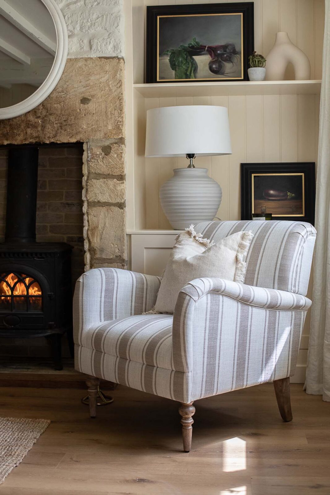 armchair next to fire in sitting room