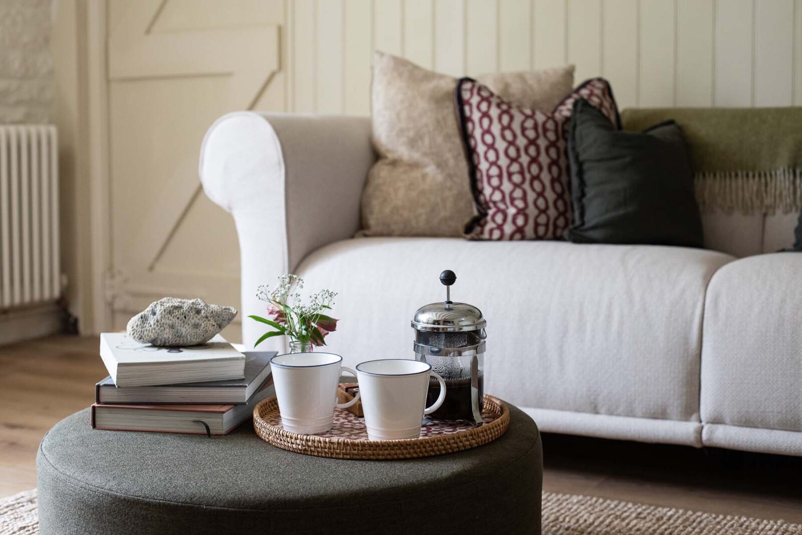 close up of cafetière by sofa