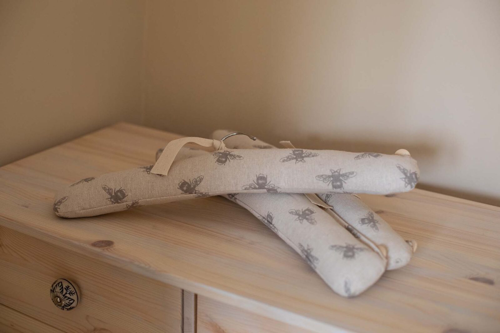 close up of coat hangers