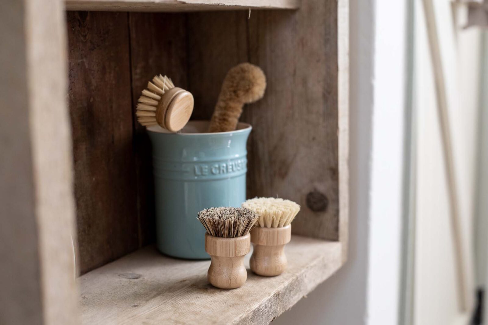 wooden kitchen cleaning utensils