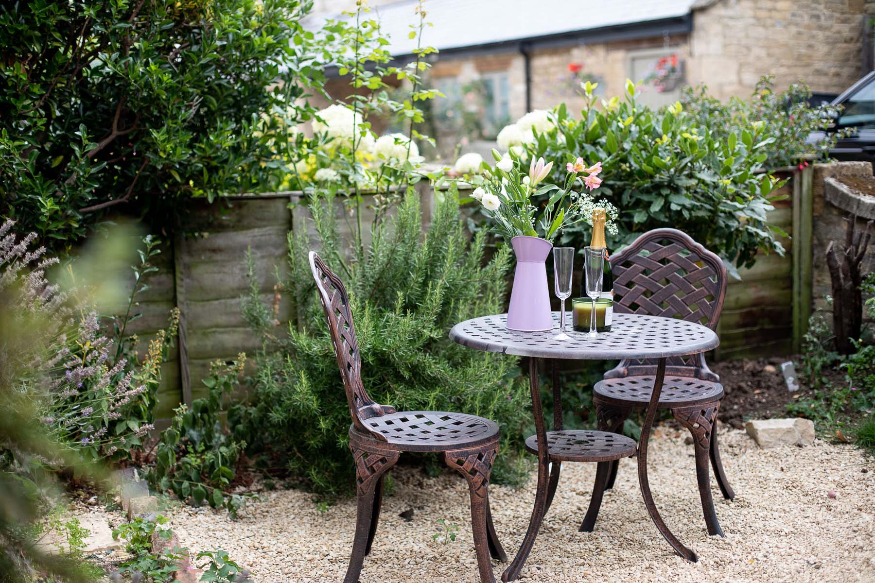 outdoor table and chairs in garden
