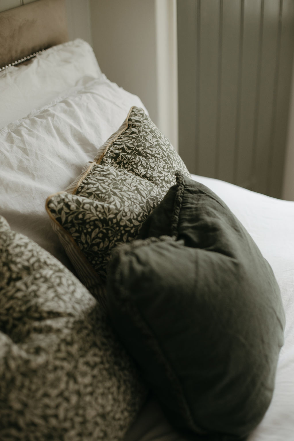 velvet cushion on bed