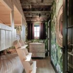 wooden bunk beds and bedroom window