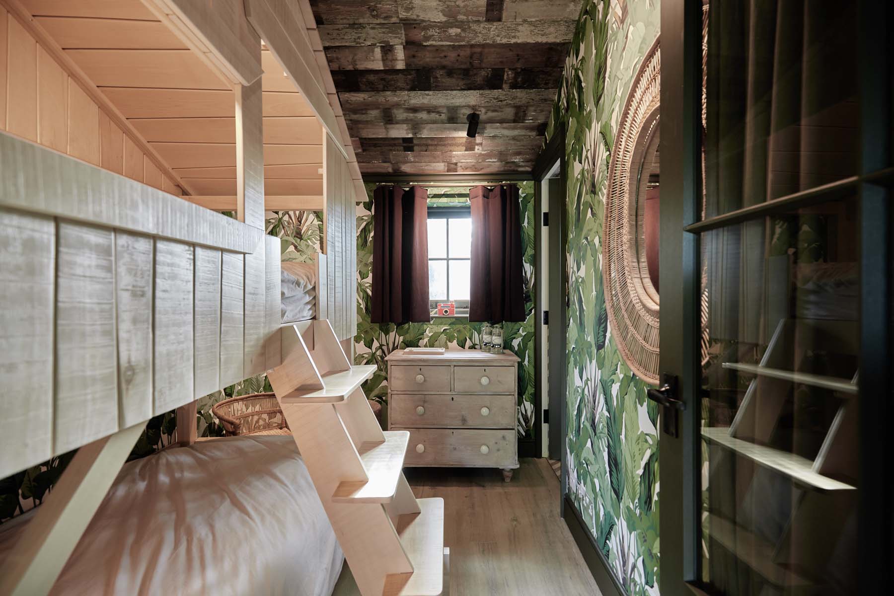 wooden bunk beds and bedroom window