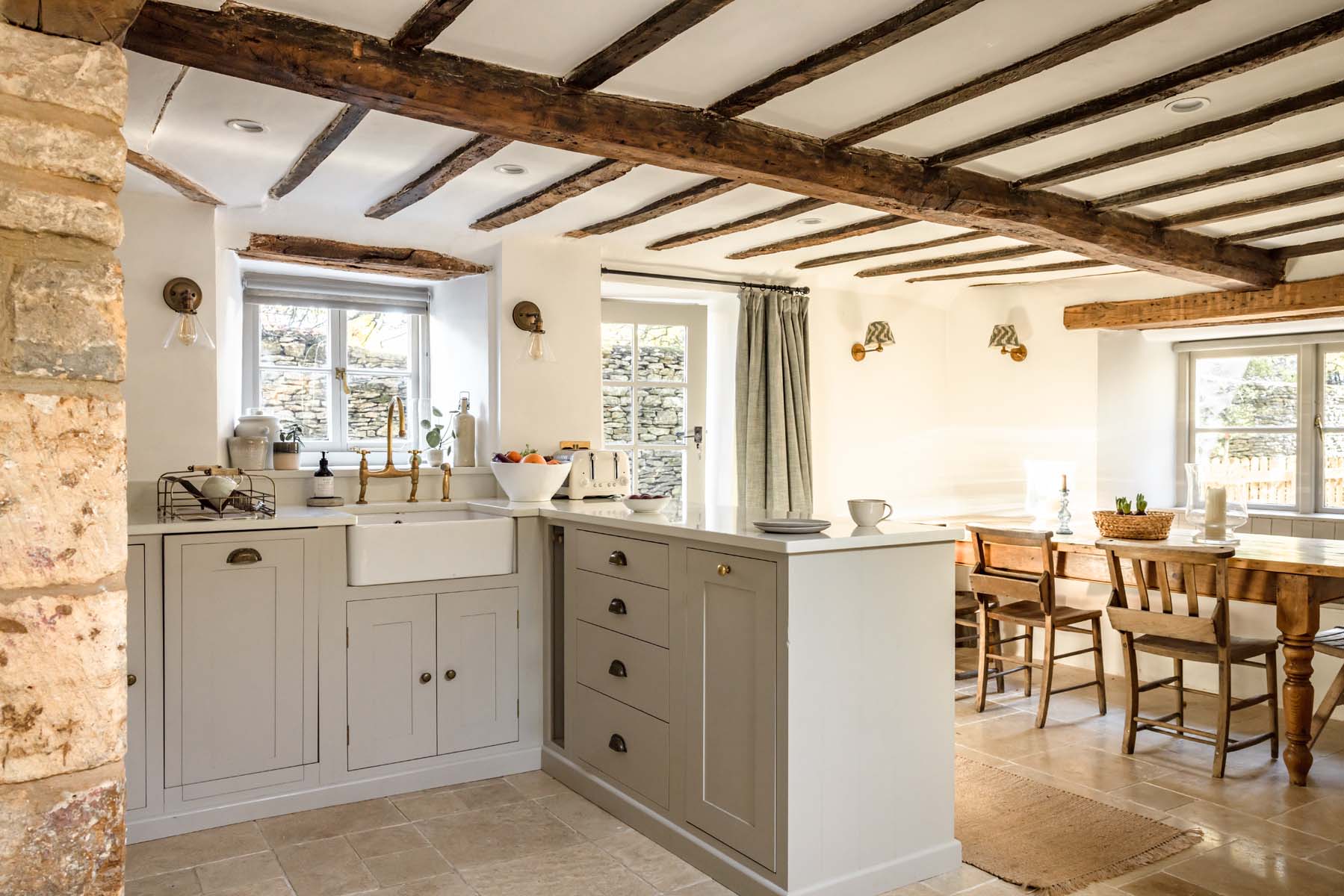 kitchen with wooden beams and dining table