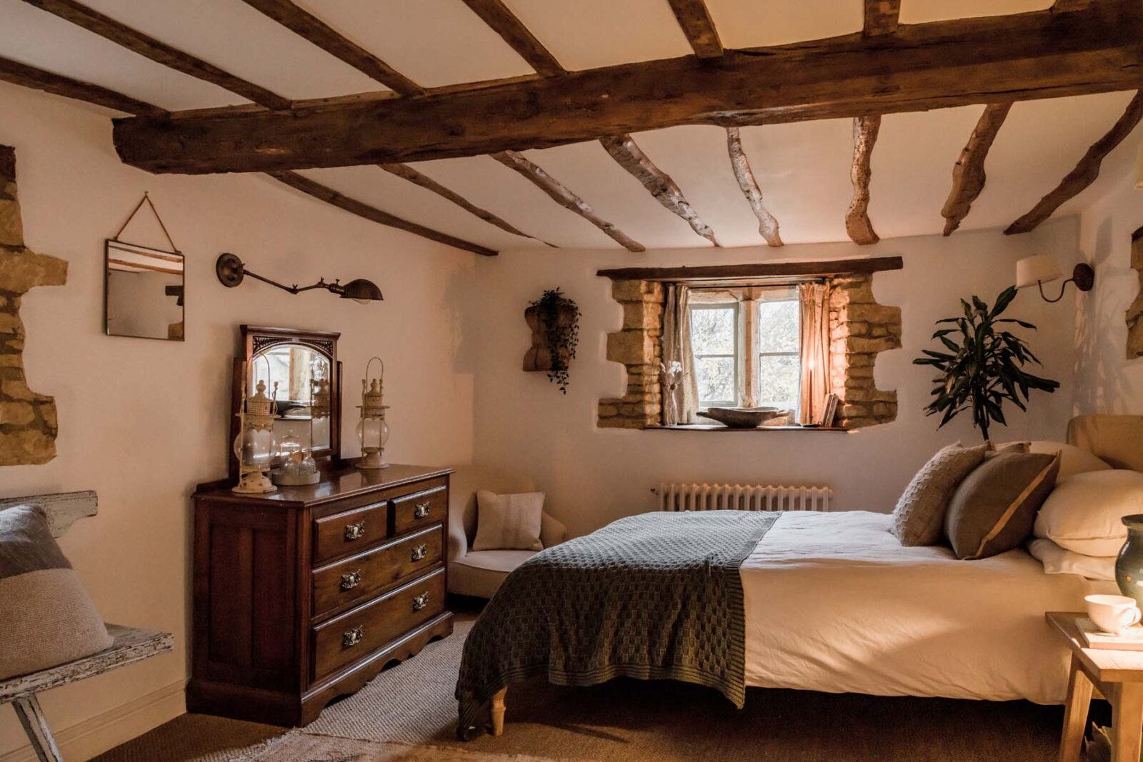 bedroom with wooden ceiling beams