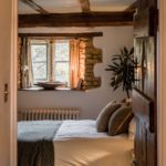 view into bedroom through doorway