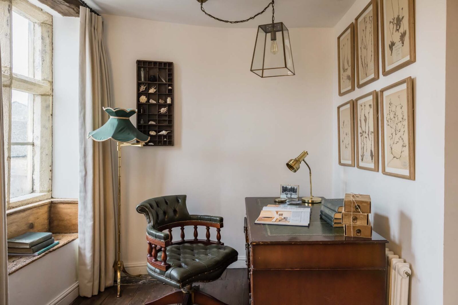 desk and chair with window behind