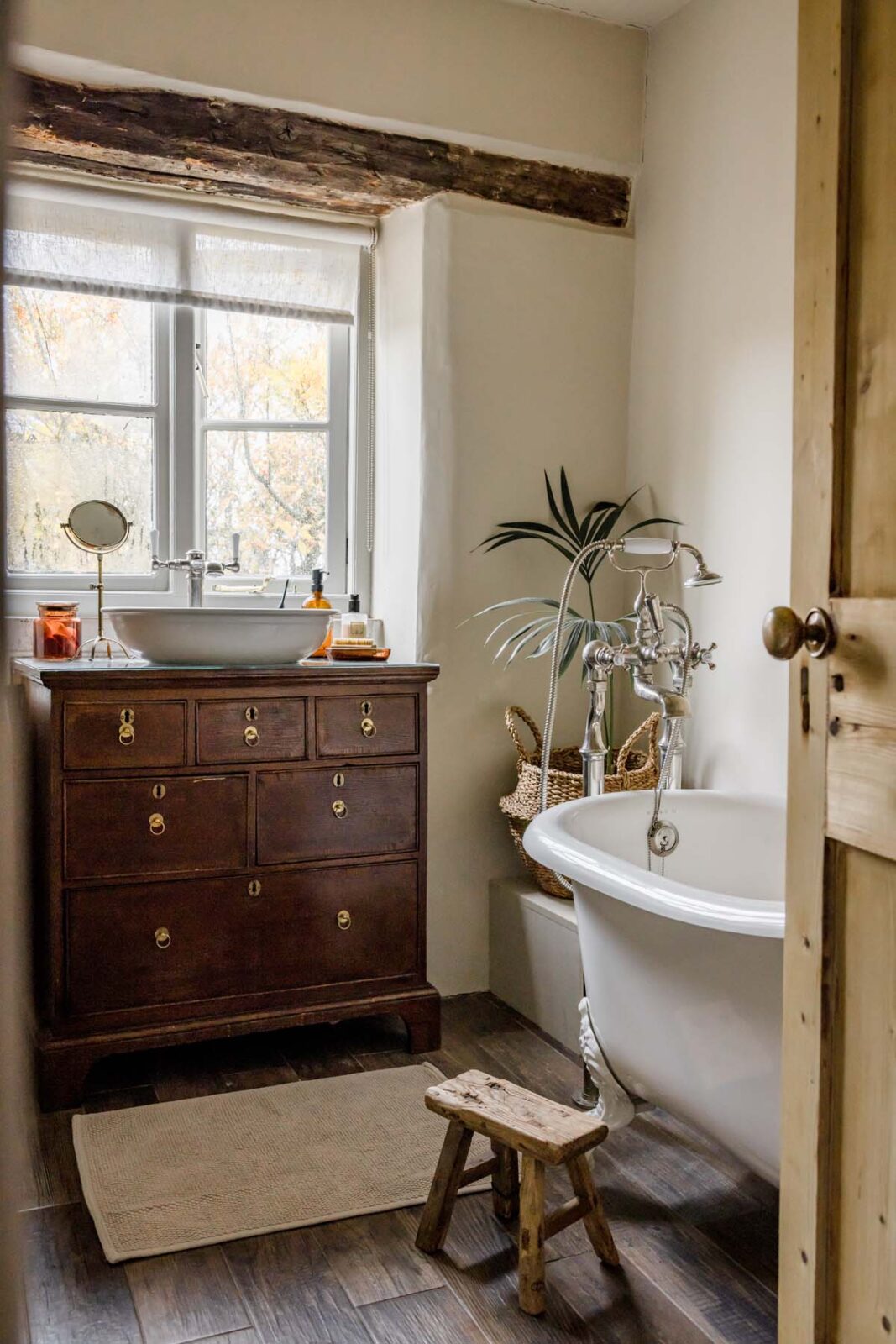 bath tub next to sink