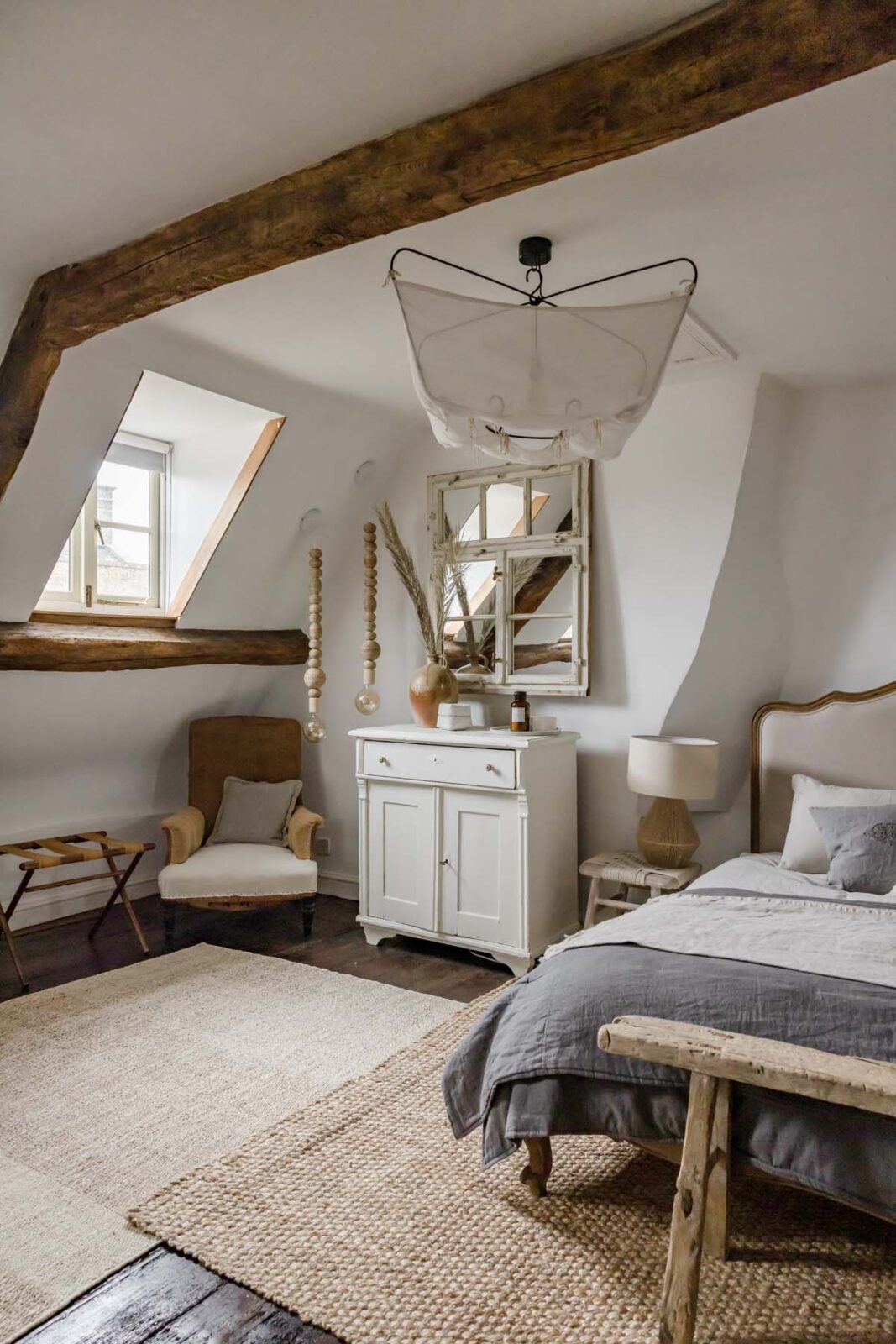 bedroom with rattan rugs and bed