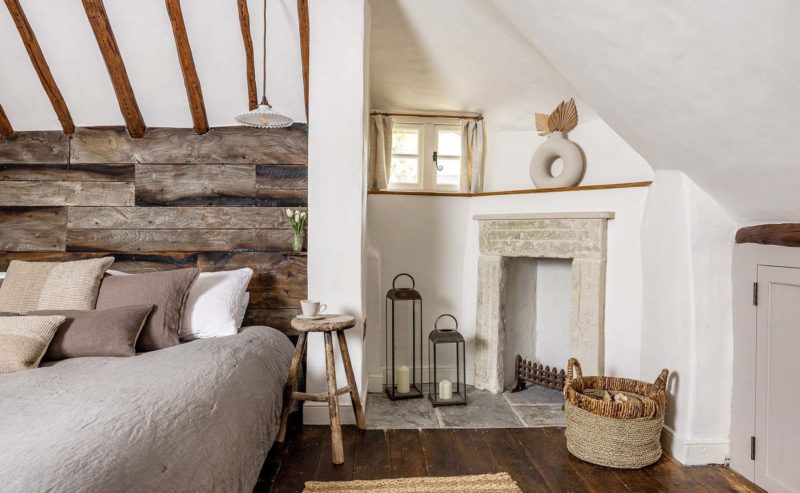 Bedroom with natural rustic decor and exposed wooden beams
