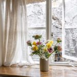 Flowers on a windowsill