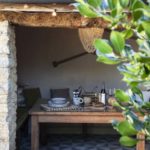 outdoor dining laid up undercover