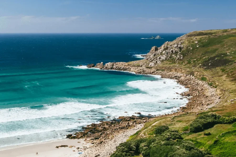 A sandy beach on a sunny day.