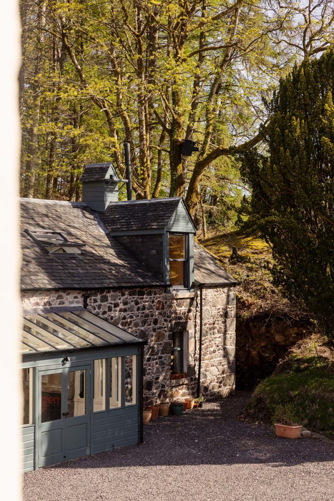 stone cottage in a forest