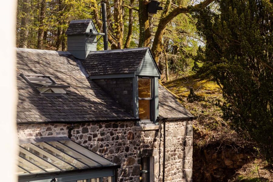 stone cottage in a forest