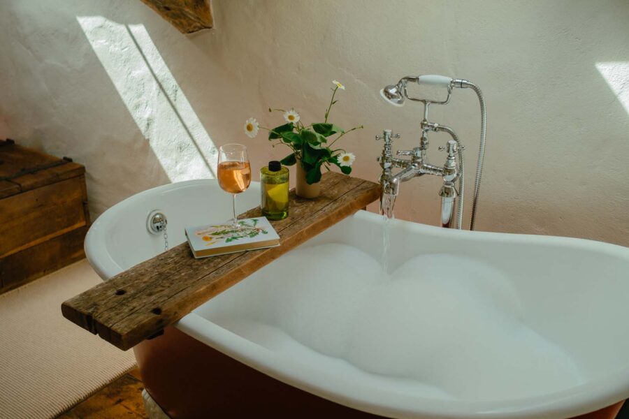 bath tub filled with bubbles