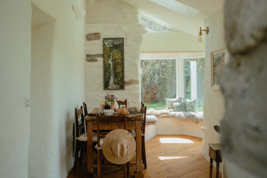 sun light coming through windows into dining room