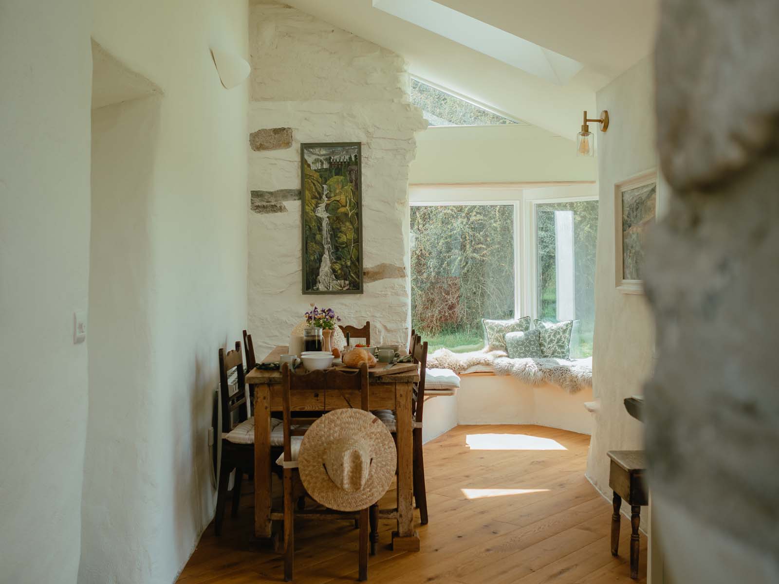 sun light coming through windows into dining room