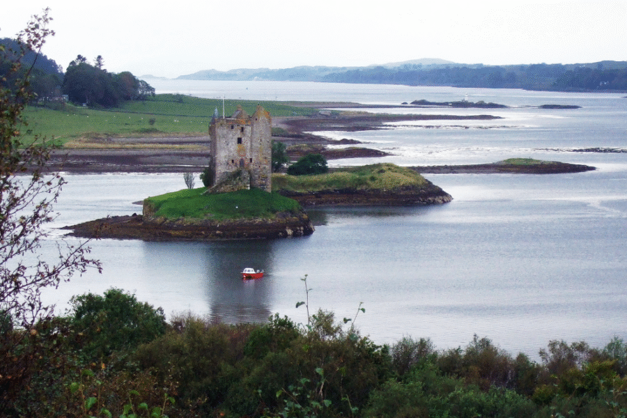 Castle in the middle of a loch surrounded by water