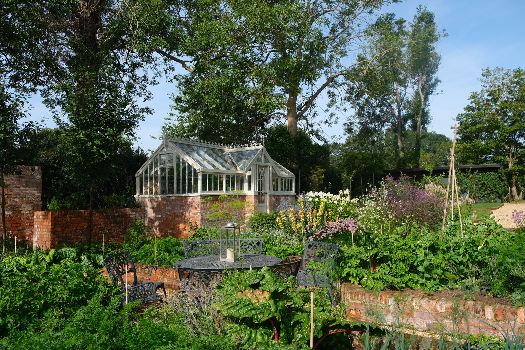 pretty kitchen garden and greenhouse